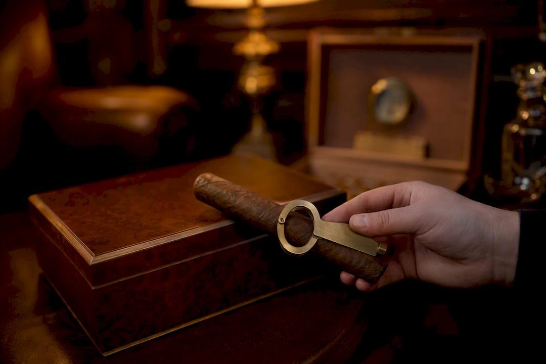 Close-up of caliper measuring cigar ring gauge