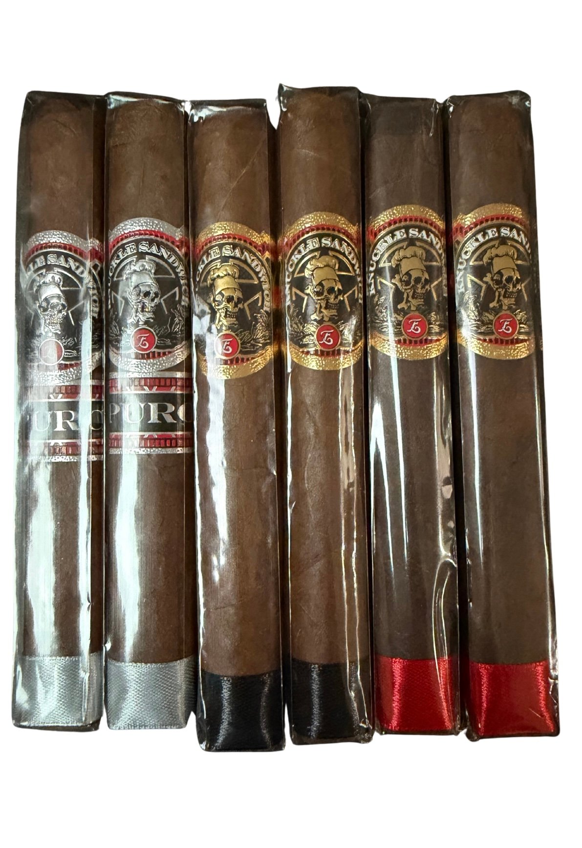 Espinosa Knuckle sandwich sampler containing 2 knuckle sandwich maduro toro, 2 knuckle sandwich nicaraguan puro toro, and 2 knuckle sandwich habano toro