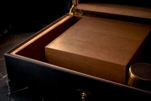 Anonymous cigar box inside cedar humidor